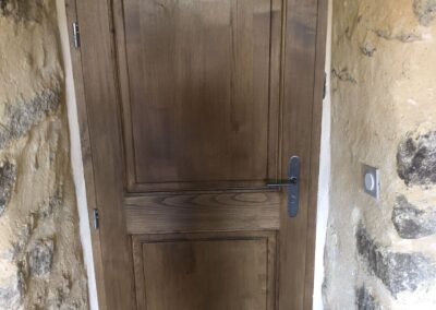 Pose de porte à Chassiers